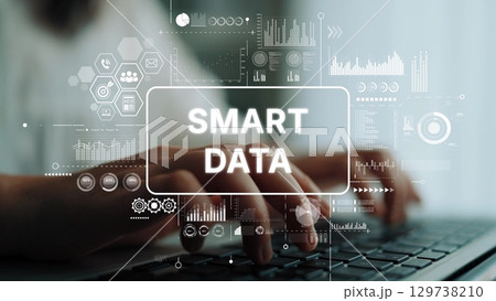 Smart Data Concept with Hands Typing on Keyboard Surrounded by Graphical User Interface Elements and Analytics Visualizations. Asymptotic smart data analytic Smart Data Concept with Hands Typing on Keyboard Surrounded by Graphical User Interface Elements and Analytics Visualizations. Asymptotic smart data analytic 129738210