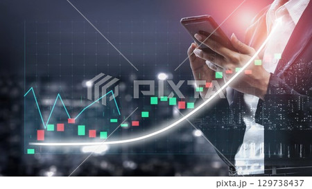 Business Professional Analyzing Stock Market Trends Using Mobile Device with Graphs and Data Visualization in Background Under Night Cityscape Copula Business Professional Analyzing Stock Market Trends Using Mobile Device with Graphs and Data Visualization in Background Under Night Cityscape Copula 129738437