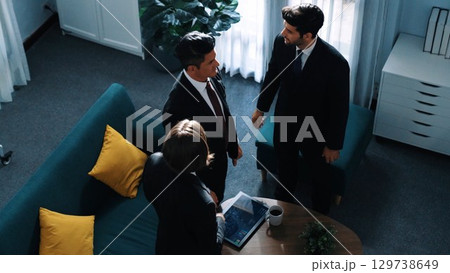 Top view of diverse people present financial chart to investor. Directorate. Top view of diverse people present financial chart to investor. Directorate. 129738649