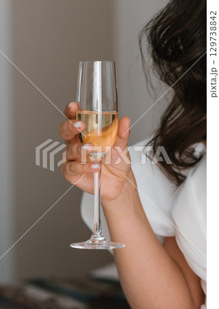 Bride Holding Champagne Glass In Hand Bride Holding Champagne Glass In Hand 129738842