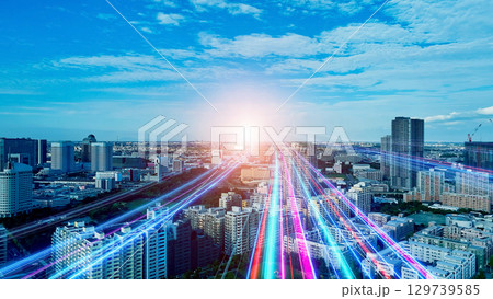 都市風景と未来へと伸びる光の帯 都市風景と未来へと伸びる光の帯 129739585