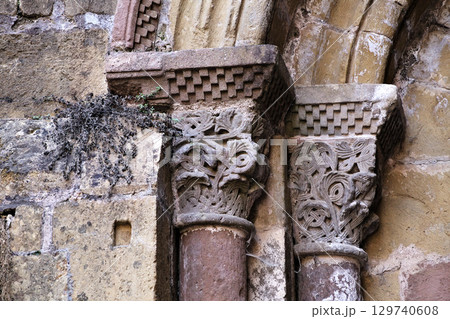 Columns of Abbey Church of Sainte-Foy in Conques, France, intricate stone carvings Columns of Abbey Church of Sainte-Foy in Conques, France, intricate stone carvings 129740608