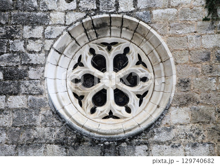 Decorative rose window of Chapel Notre-Dame in Rocamadour, France 129740682