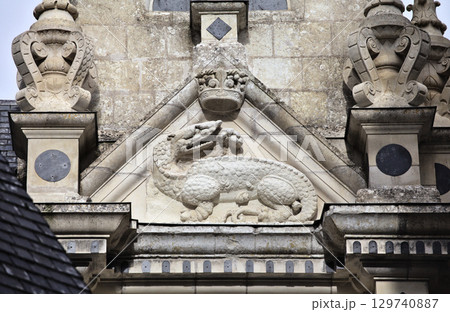 Detailed stone carving of a dragon at Chamborg castle, France 129740887
