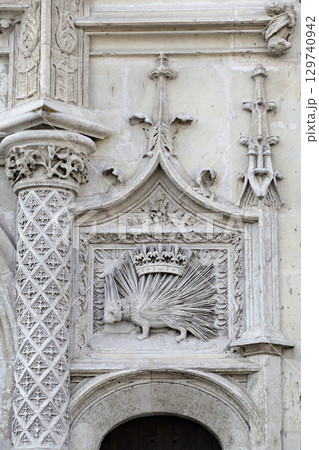 Stone relief of a porcupine with a crown displayed in Blois, France 129740942