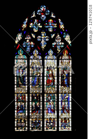 Stained glass windows depicting biblical scenes at Notre-Dame de Chartres Cathedral in France 129741018