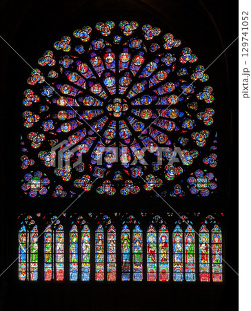 PARIS - OCTOBER 25, 2016: South rose window of Notre Dame cathedral PARIS - OCTOBER 25, 2016: South rose window of Notre Dame cathedral 129741052