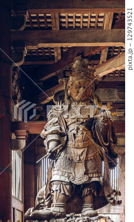 Wooden statue of Komokuten guardian at Todai ji Temple Nara 129743521