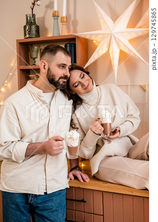 Cozy Couple Enjoying Hot Chocolate Together 129745865