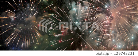 Banner Green firework in night time celebrate national holiday. Green Firework celebrate anniversary happy new year 2024 4th of july holiday festival. Countdown New year 2025 festival with copy space 129748231