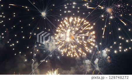 Golden Firework celebrate anniversary independence day night time celebrate national holiday. Countdown to new year 2024 party time event. Happy new year 2025, 4th of july holiday festival concept Golden Firework celebrate anniversary independence day night time celebrate national holiday. Countdown to new year 2024 party time event. Happy new year 2025, 4th of july holiday festival concept 129748272