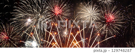 Banner Golden Firework celebrate anniversary independence day night time celebrate national holiday. Countdown 2024 party time event. Happy new year 2025 4th of july holiday festival with copy space 129748287