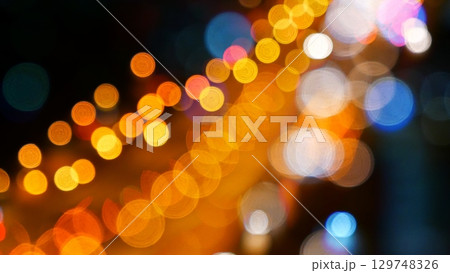 Blurred background night city bokeh car drive on road in nightlife. Light line traffic jam in black night. Blur street flare traffic motion movement. Cityscape Urban dark background twilight time 129748326