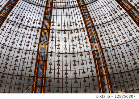 An Intricate and Stunning Stained Glass Dome Design. Galeries Lafayette Paris, France An Intricate and Stunning Stained Glass Dome Design. Galeries Lafayette Paris, France 129750807