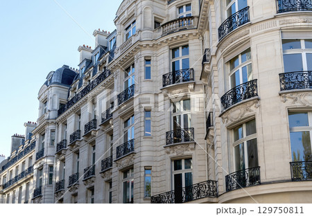 The Elegant and Iconic Parisian Architecture Enhanced by Beautiful Classic Balconies The Elegant and Iconic Parisian Architecture Enhanced by Beautiful Classic Balconies 129750811
