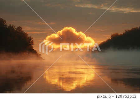 Serene Lake at Sunrise with Cloud Reflection Over Misty Water in Vibrant Colors Serene Lake at Sunrise with Cloud Reflection Over Misty Water in Vibrant Colors 129752612