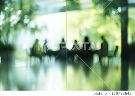Modern Office Environment Featuring Diverse Professionals Collaborating Together 129752649
