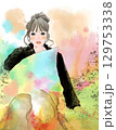 A girl sitting with a cushion 129753338
