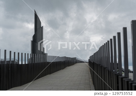 Frozen fountain on the background of cloudy sky, bridge, Batumi 129753552