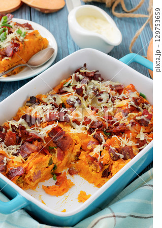 sweet potato casserole with bacon, cheese, onion sweet potato casserole with bacon, cheese, onion 129753659