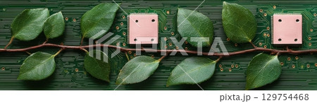 Nature Meets Technology: Green Leaves and Microchips on Circuit Board Background 129754468