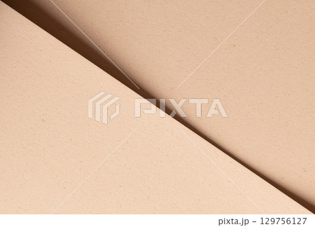 Beige designer paper texture with sandy, minimalistic backdrop. Modern, premium surface with matte 129756127