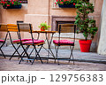Outdoor Cafe Seating Chairs and tables 129756383