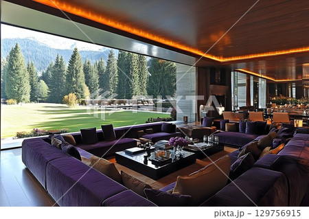 Modern living room interior with mountain view purple sofas large windows 129756915