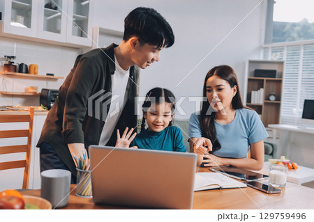 Family spends their free time together 129759496