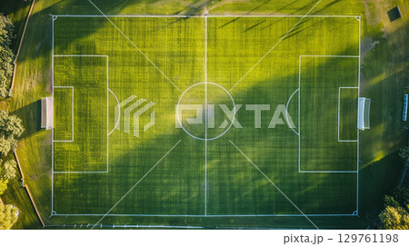 Aerial View of a Well-Maintained Soccer Field on a Sunny Day. Concept of Sports Facilities, Recreational Spaces, Athletic Grounds, and Community Playgrounds 129761198