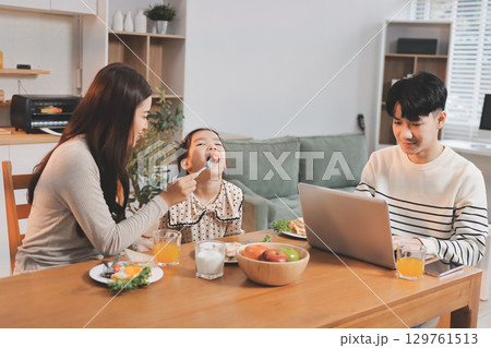 Family spends their free time together 129761513
