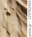 Wind Sculpted Sand Dunes Texture in Desert - Abstract Natural Pattern 129762460
