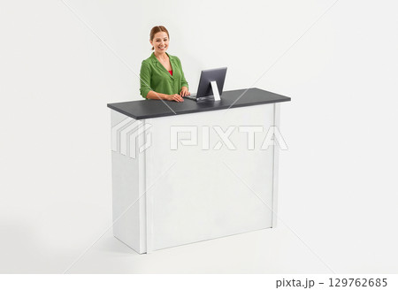 Woman standing near white promo counter mockup, ai generated 129762685