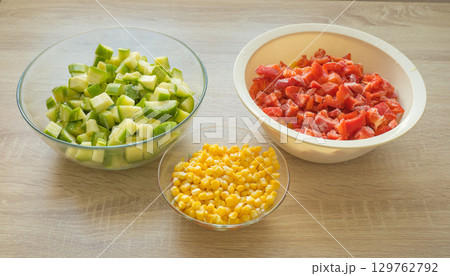 Frozen mixed vegetables, carrots, corn, peppers and zucchini. Preparations for the winter. Frozen mixed vegetables, carrots, corn, peppers and zucchini. Preparations for the winter. 129762792
