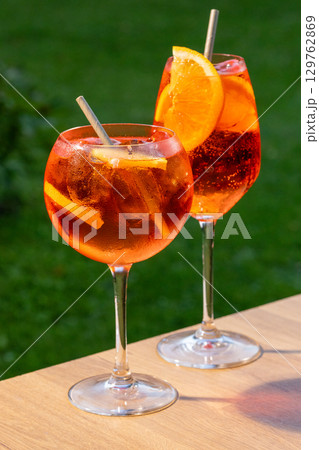 glasses of aperol spritz cocktail 129762869