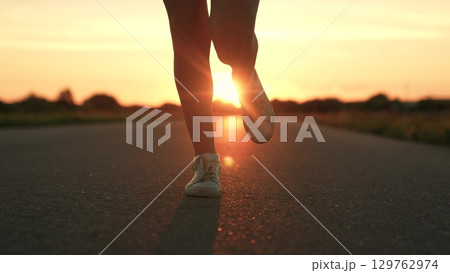 silhouette sports girl running legs along road sunset, marathon preparation lifestyle, running athlete, profile exercises, fitness sports woman running up, sunset health, professional runner stadium 129762974
