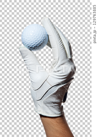 Golf ball held in gloved hand isolated on transparent background, professional sport equipment close-up 129763885
