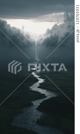 Winding river flows upward into dramatic clouds, creating surreal and mysterious landscape 129765931