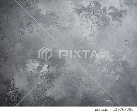 Dirty gray grunge metal wall texture with a rough and retro pattern 129767386