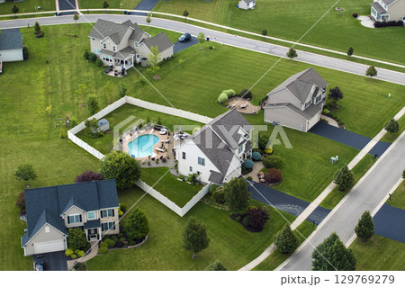 Housing market in the USA. Residential homes in suburban sprawl development in Rochester, New York. Low-density two story private houses in rural suburbs Housing market in the USA. Residential homes in suburban sprawl development in Rochester, New York. Low-density two story private houses in rural suburbs 129769279