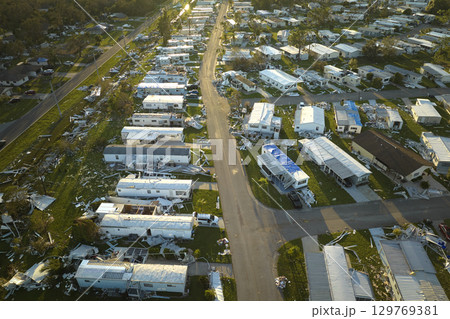 Destroyed by hurricane Ian suburban houses in Florida mobile home residential area. Consequences of natural disaster Destroyed by hurricane Ian suburban houses in Florida mobile home residential area. Consequences of natural disaster 129769381