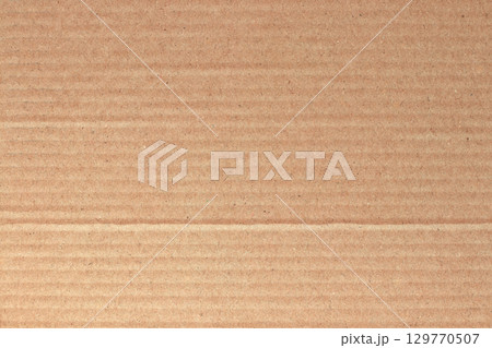 Brown cardboard sheet abstract background, texture of recycle paper box in old vintage pattern for design art work. Brown cardboard sheet abstract background, texture of recycle paper box in old vintage pattern for design art work. 129770507