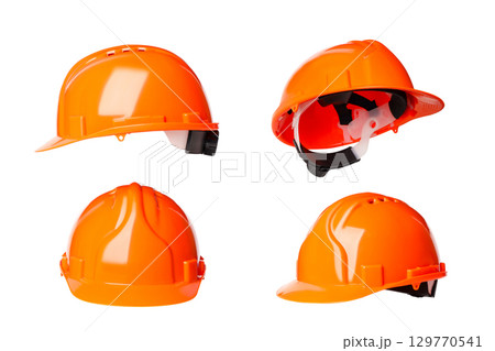 Orange hard hats promote safety on Labor Day, isolated on white, PNG 129770541