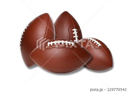 Three brown footballs on a white backdrop, isolated on white, PNG 129770542
