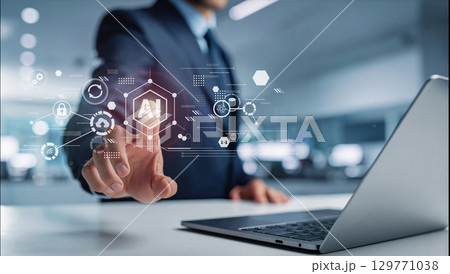 ビジネスマンがタッチパネルを指でタッチするポーズ、生成AIを活用したデジタルワークフロー 129771038