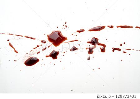 Splatters of blood drops, blood splashes, or blood spots on a white background. Concept of Halloween Splatters of blood drops, blood splashes, or blood spots on a white background. Concept of Halloween 129772433