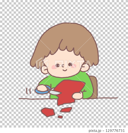 圖:一個孩子熟練地用剪刀剪紅色建築紙,享受手工製作的樂趣 圖:一個孩子熟練地用剪刀剪紅色建築紙,享受手工製作的樂趣 129776731