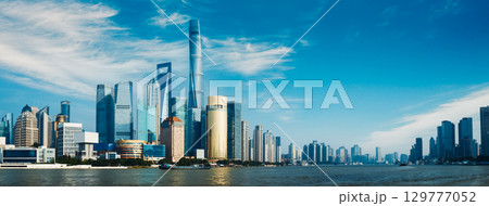 Dramatic Skyline Highlighted by Iconic Structures and Building Reflections Shanghai, China Dramatic Skyline Highlighted by Iconic Structures and Building Reflections Shanghai, China 129777052