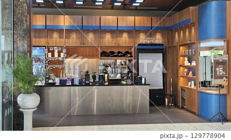 this is food and drink display at cafe  129778904