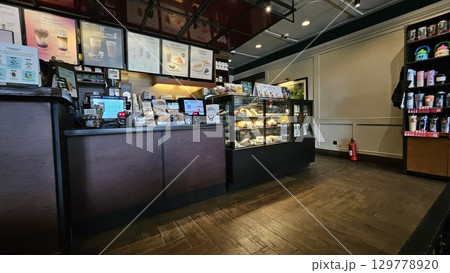 this is food and drink display at cafe  129778920